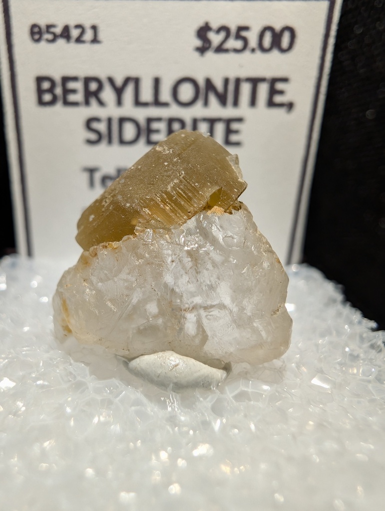 Beryllonite, Siderite