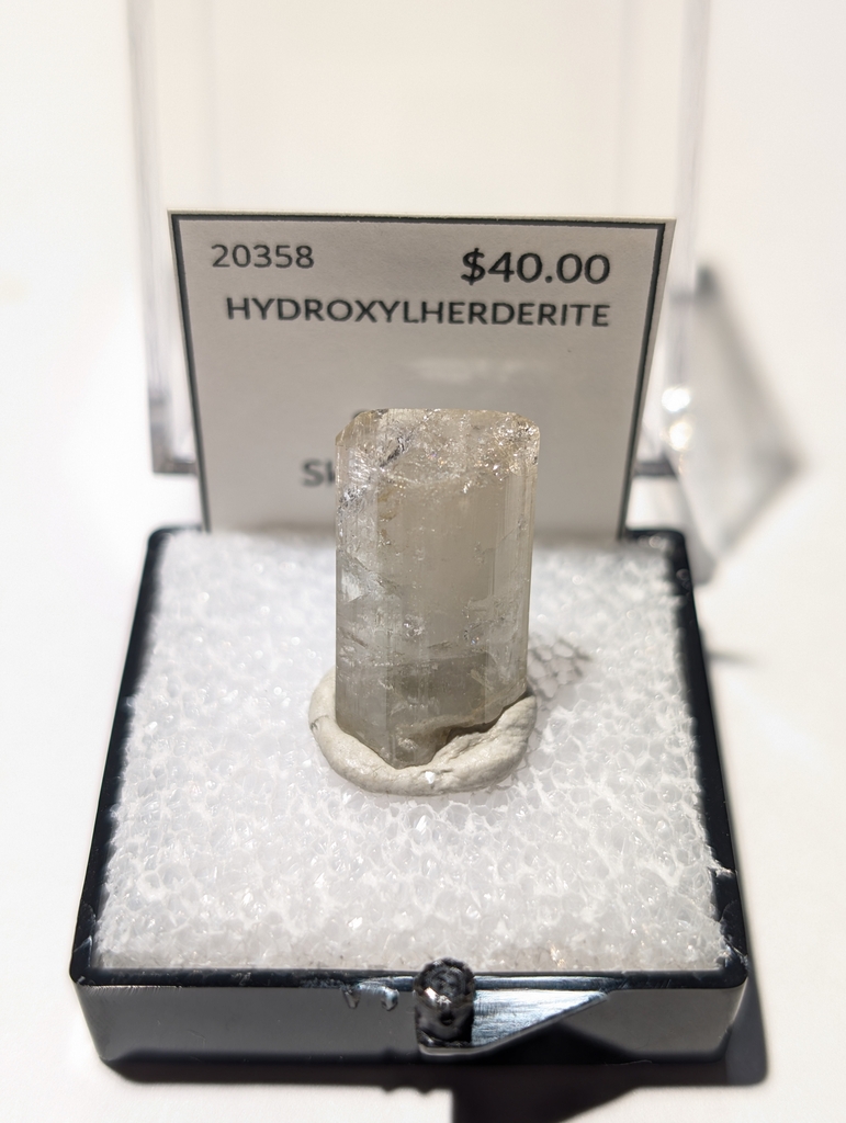 Hydroxylherderite