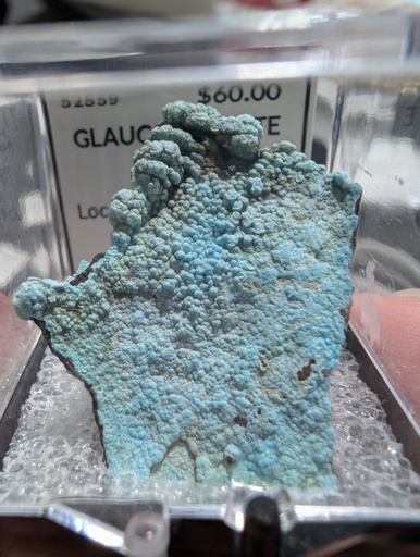 Glaucocerinite